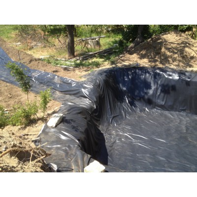 Монтаж плівки ПВХ для ставків і водойм